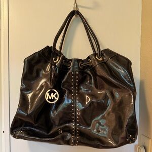 Michael Kors Black and Gold Tote with Elegant Design